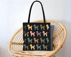 Black tote bag with colorful dog pattern