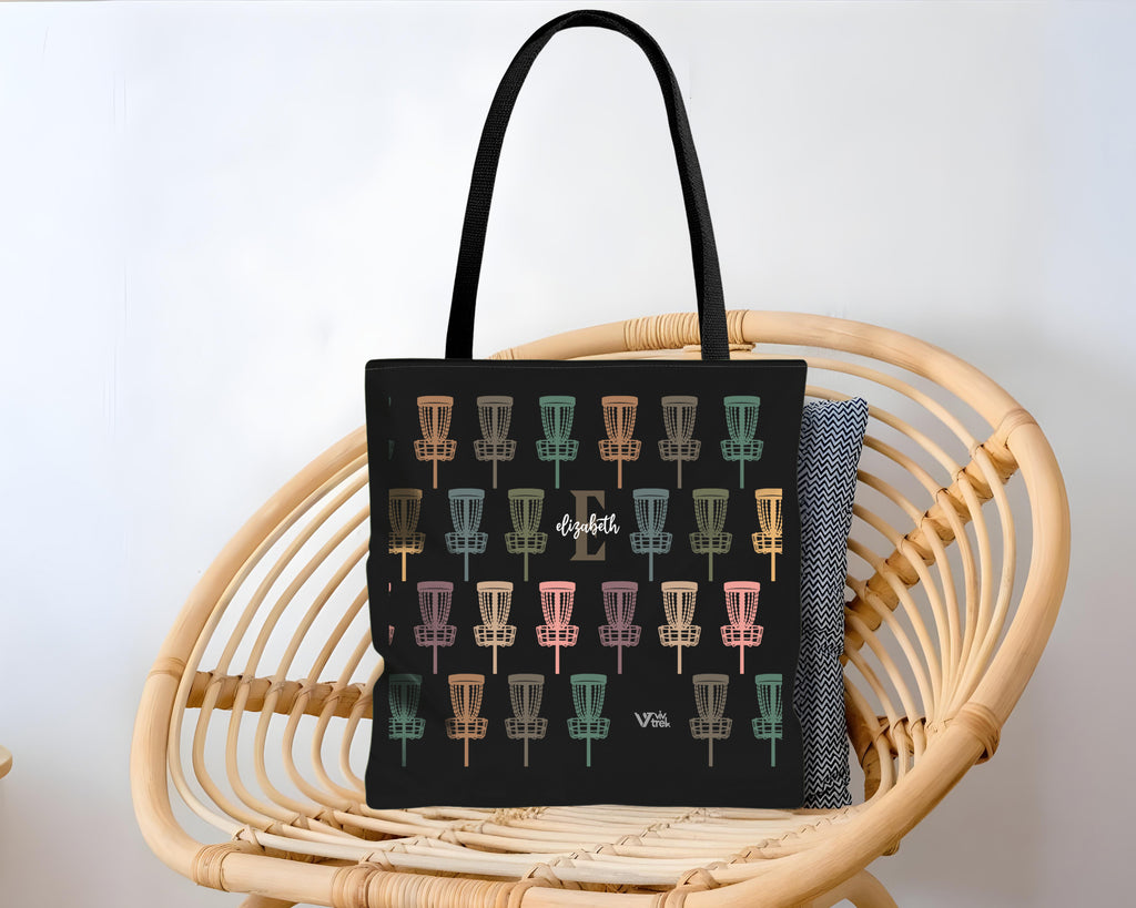 Black tote bag with disk golf pattern and name text