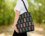 Person holding a black tote bag with disc golf basket pattern outdoors background