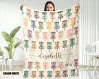 Person holding a blanket with disc golf disc pattern and name on a white background