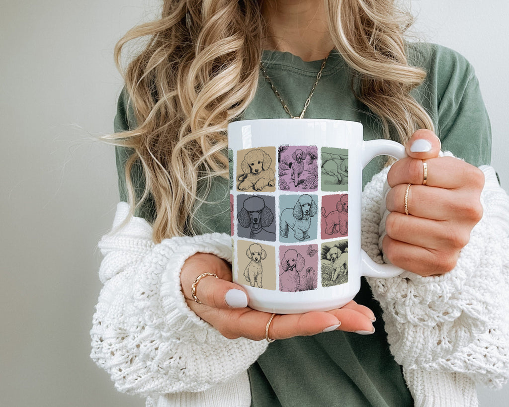 Person holding a mug with colorful dog pattern
