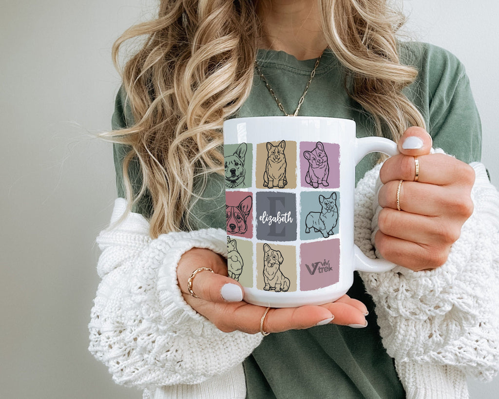 Person holding a mug with dog illustrations and text