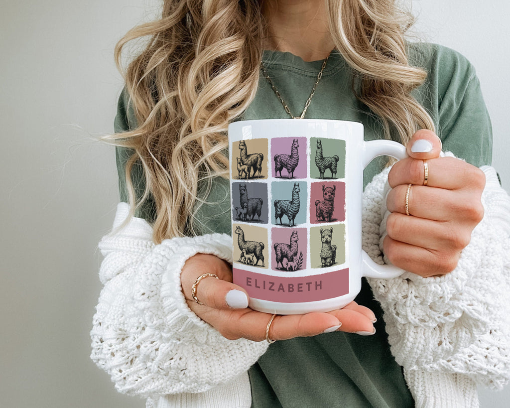 Person holding a mug with llama design and Name' text