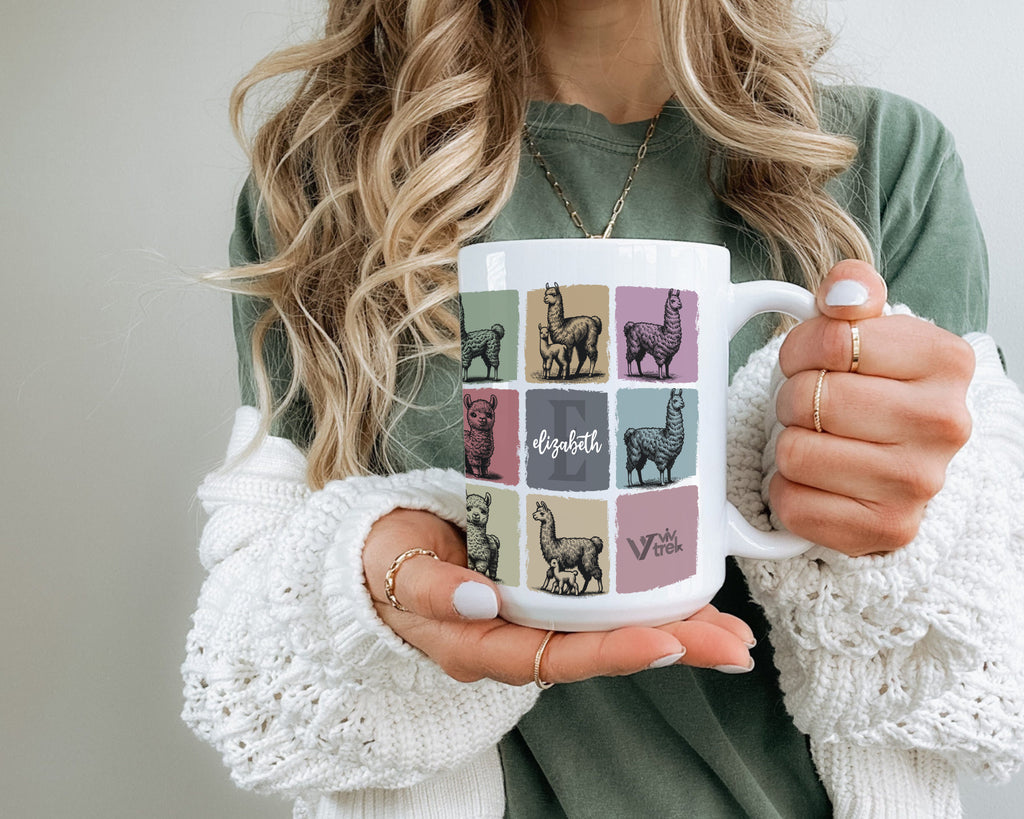 Person holding a mug with llama design and text