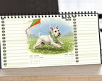 Desk calendar with a dog illustration on a desk